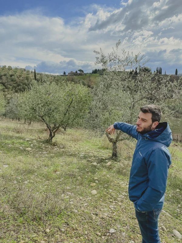 Stefano points at their vineyard neighbors, all high-end names.